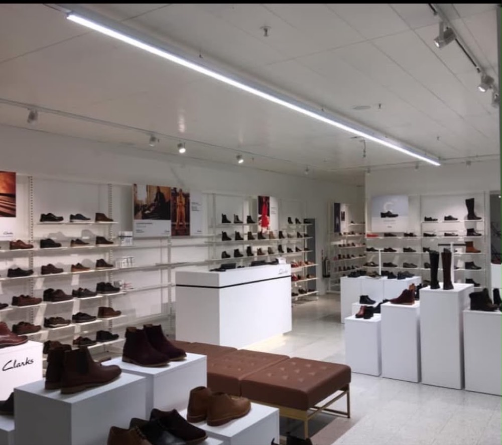 Bright LED lighting installation in a retail shoe shop